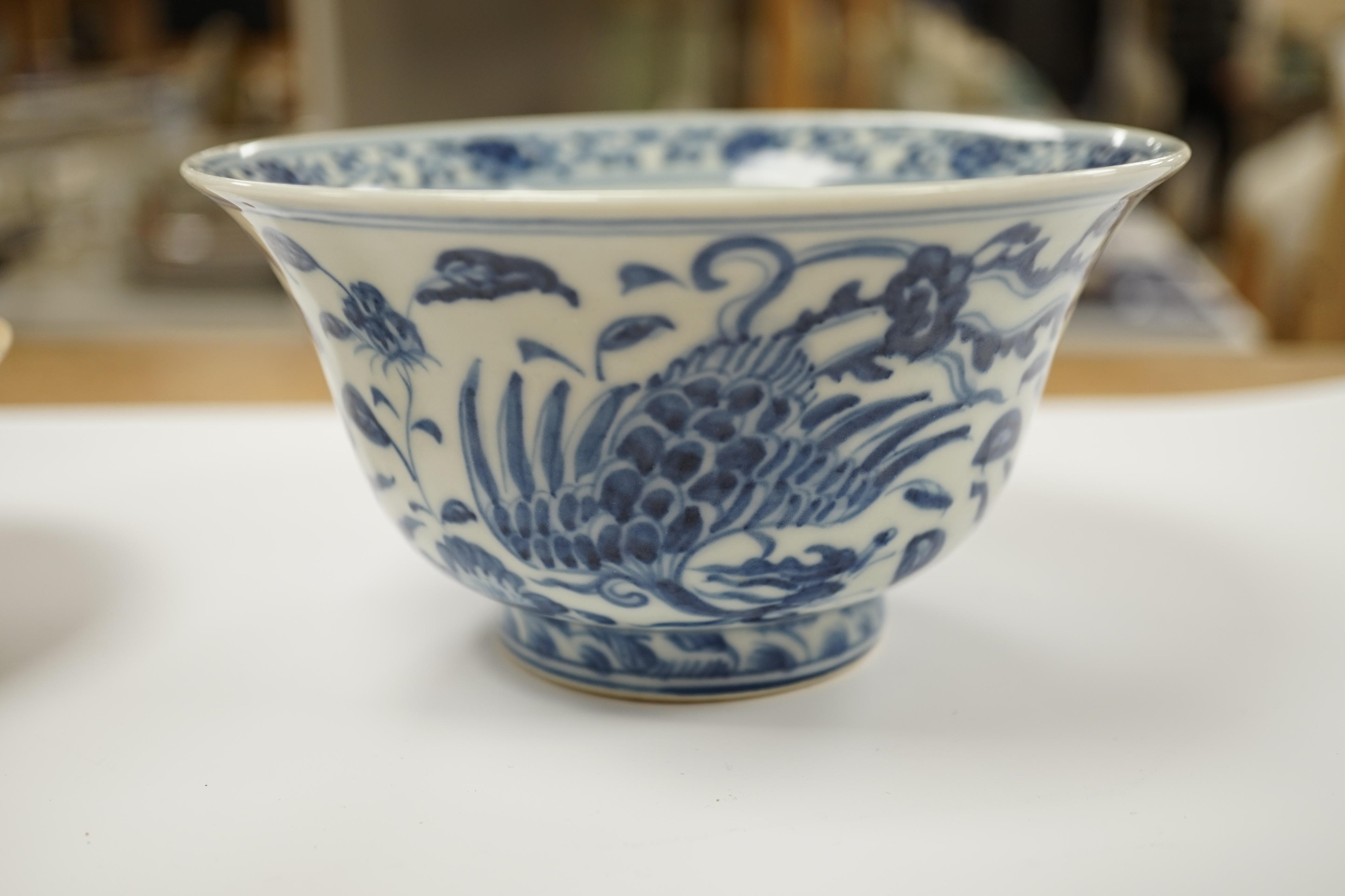 A Chinese blue and white porcelain bowl, Xuande mark but later and another bowl